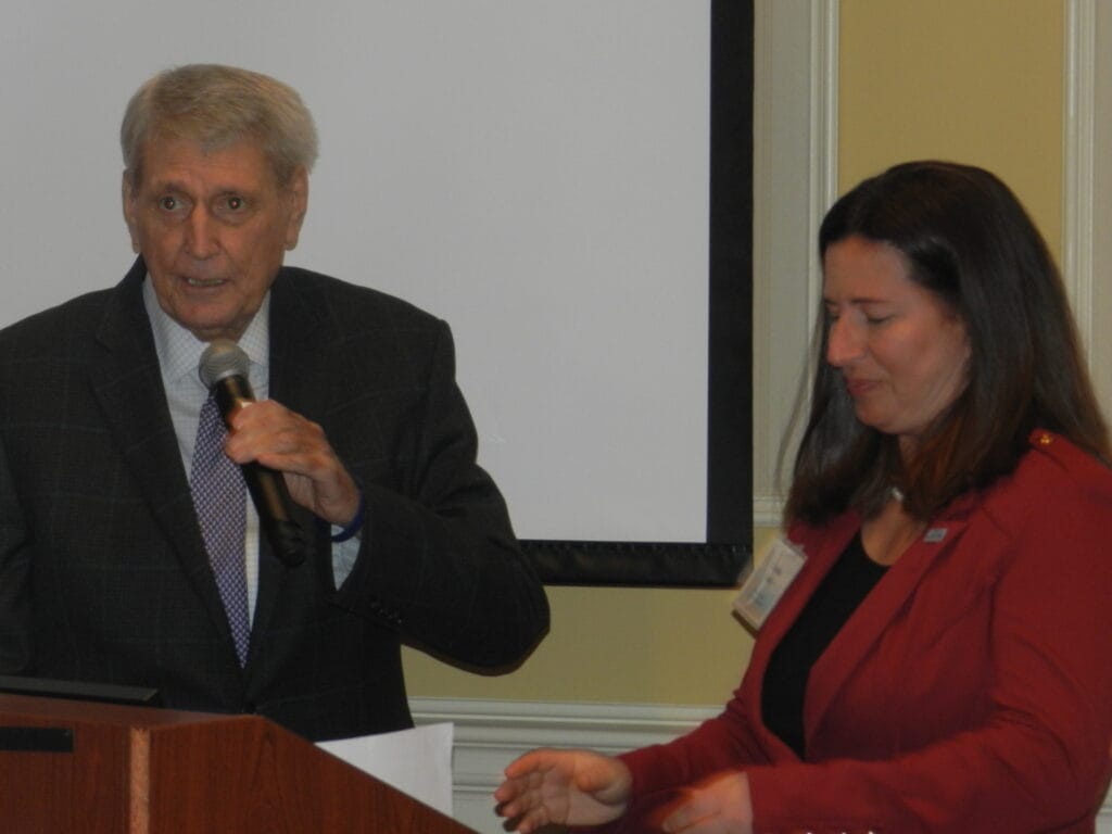 with speaker Busch